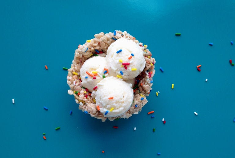 <p><strong>Crispy Rice Cereal Bowls</strong><br /> In a large pot, melt 4 tablespoons butter over medium heat. Add 1 10-oz. bag of marshmallows, and cook, stirring, until melted. Fold in 5 cups rice cereal and 1/2 cup of sprinkles, being careful to not over-mix (the sprinkles will start to dye the cereal). Remove the pot from the heat; let cool slightly.</p> <p>Spray jumbo muffin tin with nonstick cooking spray. When cool enough to handle, spray hands with cooking spray, and press cereal mixture into the muffin tins, forming bowls. Set for 1 hour, remove from muffin tins, and serve with ice cream. Top with more sprinkles.</p>
