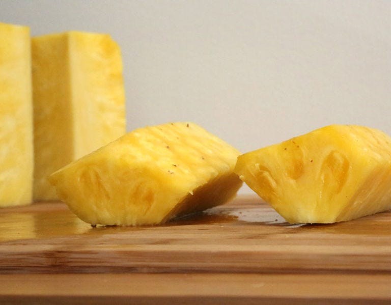 <p>Now you have ready-to-cut pineapple spears.</p>