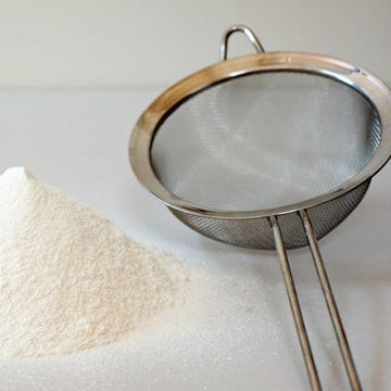 <p>Sift the dry ingredients — for eight portions of pasta: 3 1/2 cups type <a href="http://www.amazon.com/gp/product/B0038ZS6PU" target="_blank">00 flour</a> and a generous pinch of salt — together onto a clean work surface. </p>