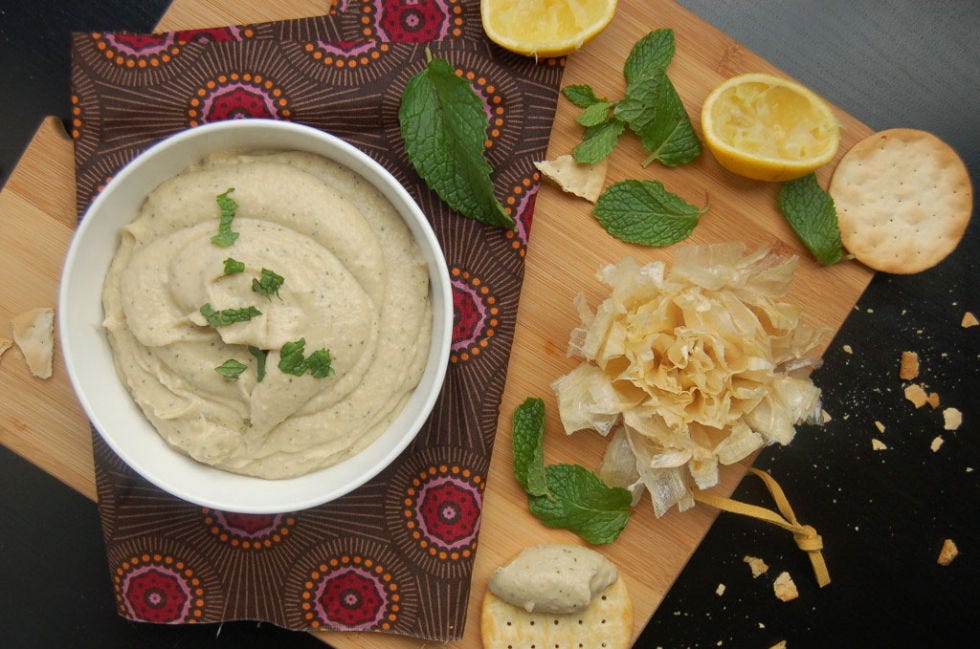 <p>Serve with veggies, chips, pretzels, or use as a spread on game-day sandwiches. Adding mint to traditional hummus gives it a cool, refreshing after-taste, making it the perfect sidekick to spicy food. (We're looking at you, wings.)</p>
<p>Get the recipe from <a href="http://www.veganhousewives.com/vegan-gluten-free-recipe-roasted-garlic-mint-white-bean-hummus-or-is-it-puree/">Vegan Housewives</a>.</p>
