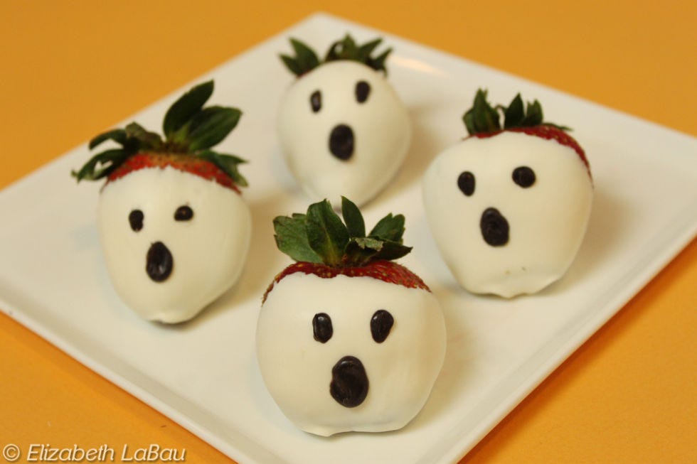 <p>Let little hands help out with these sweet treats that won't cause cavities. They're a great compromise between healthy snack and candy thanks to a generous dip of white chocolate.</p>
<p><strong>Get the recipe from <a href="http://candy.about.com/od/halloweencandyrecipes/r/Ghost-Strawberries.htm" target="_blank">About Food</a>.</strong></p>