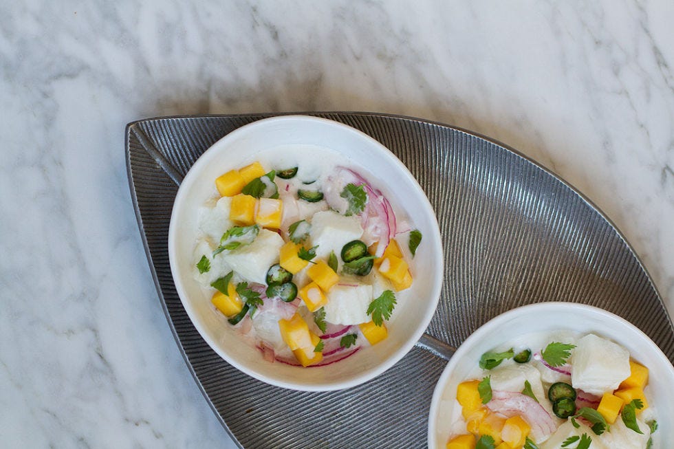 <p>This ceviche took a geographic turn and headed toward the Caribbean, and we're loving it. Mango and coconut milk replace the citrus juice, a swap that feels like vacation in a bowl and saves you some work juicing — that's a decision we can all get behind.</p>
<p><strong>Get the recipe from <a href="http://www.aidamollenkamp.com/2014/07/coconut-chile-basil-ceviche-recipe/" target="_blank">Aida Mollenkamp</a>.</strong></p>