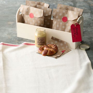 <p>Everyone loves the classic combination of tangy mustard and soft, salty pretzels. So dress this treat for Christmas, with a stepped up, sweet and herbaceous Dijon for dipping.</p>
<p><strong>Recipe:</strong> <a href="http://www.countryliving.com/recipefinder/pretzels-brown-sugar-rosemary-dijon-recipe-clx1213" target="_blank">Pretzels with Brown-Sugar Rosemary Dijon</a></p>