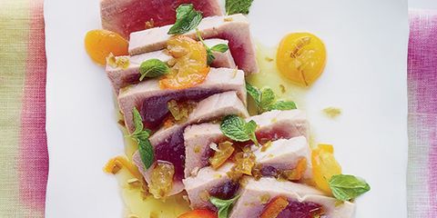 <p>This incredibly quick and easy dish from New Orleans chef Donald Link's <i>Down South</i> cookbook features tuna steaks poached until rare in a bright, buttery sauce that's infused with tangy lime and kumquats, spicy jalapeños, and fresh mint. Doubled or tripled, it would make an excellent dinner-party dish.</p><p><strong>Recipe:</strong> <a href="http://www.delish.com/recipefinder/poached-tuna-kumquats-jalapeno-recipe-fw0314"><strong>Poached Tuna with Kumquats and Jalapeño</strong></a></p>