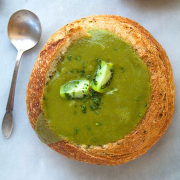 <p>This beautiful green soup pairs the tartness of green tomatoes with fragrant basil and thyme. Once you've finished off the soup you can eat the sourdough bread bowl.</p><p><strong>Recipe:</strong> <a href="http://www.delish.com/recipefinder/roasted-green-tomato-basil-soup-sourdough-recipe-fw0614"><strong>Roasted Green Tomato Basil Soup in Sourdough</strong></a></p>