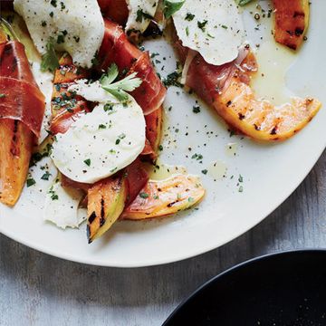 <p>Grilling cantaloupe wedges intensifies their sweetness and adds smoky flavor. They're delicious with the salty prosciutto and creamy mozzarella, which melts slightly when you drape it over the melon as it comes off the grill.</p><p><strong>Recipe:</strong> <a href="http://www.delish.com/recipefinder/grilled-cantaloupe-prosciutto-mozzarella-recipe-fw0614"><strong>Grilled Cantaloupe with Prosciutto and Mozzarella</strong></a></p>
