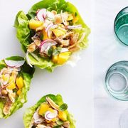 This Asian-inspired chicken dish is light, fresh, and delicious. Best of all, you can prepare it in just one bowl.<br /><br /><a href="http://www.redbookmag.com/recipefinder/chicken-peanut-salad-lettuce-cups-recipe"><b>Get the recipe!</b></a>