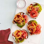 <p>Though this sandwich is fresh and light, prosciutto keeps it satisfying and substantial enough to make it a filling summer lunch.</p>
<p><strong>Recipe:</strong> <a href="http://www.countryliving.com/recipefinder/heirloom-tomato-sandwiches-recipe-clv0913" target="_blank">Heirloom-Tomato Sandwiches</a></p>