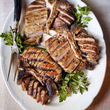 <p>The bright herb sauce compliments the rich, grilled flavor of the pork in this dish.</p>
<p><strong>Recipe:</strong> <a href="http://www.countryliving.com/recipefinder/grilled-pork-chops-scallion-herb-sauce-recipe-clv0913" target="_blank">Grilled Pork Chops with Scallion-Herb Sauce</a></p>