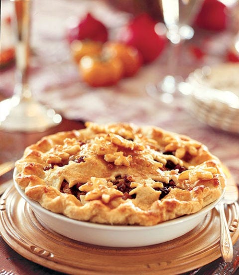 Quince Mince Pie Mincemeat and Granny Smith apples make this pie as delightfully golden as the childhood memories we associate with it. To save time, use store-bought dough to speed preparation.