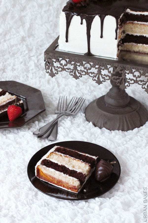 strawberry tuxedo cake with whipped white chocolate frosting