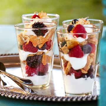 mixed summer berry and yogurt parfaits with toasted coconut
