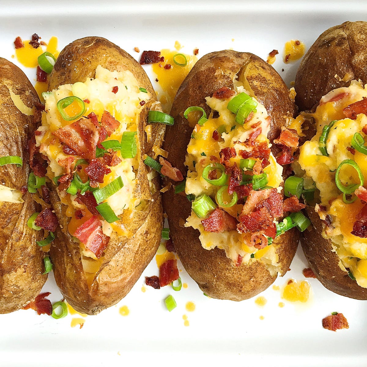 preview for Give The Basic Baked Potato An Upgrade With These Cheesy Loaded Baked Potatoes
