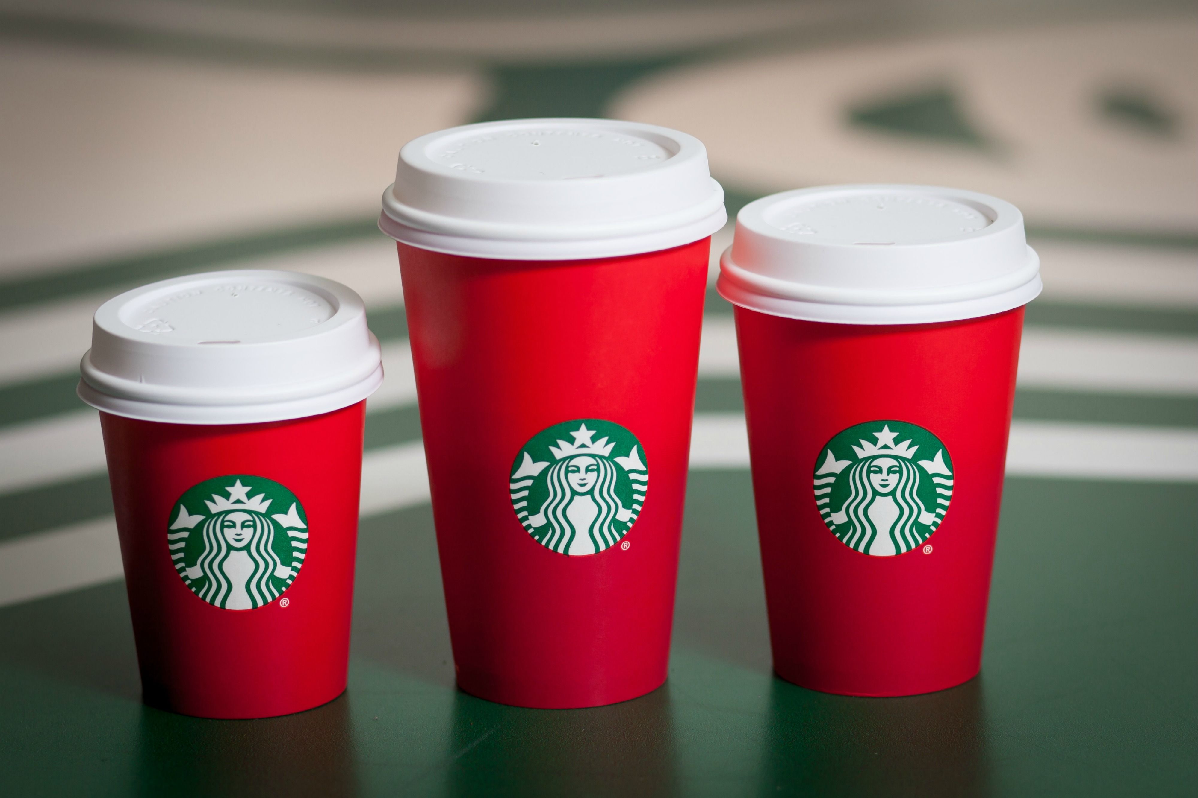 https://hips.hearstapps.com/delish/assets/15/46/1447185807-starbucks-red-holiday-cups-2015.jpg