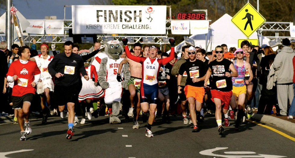 preview for People Run 5 Miles And Eat A Dozen Donuts In The 'Krispy Kreme Challenge'