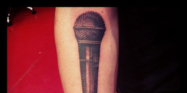 Zayn Malik reveals new microphone tattoo