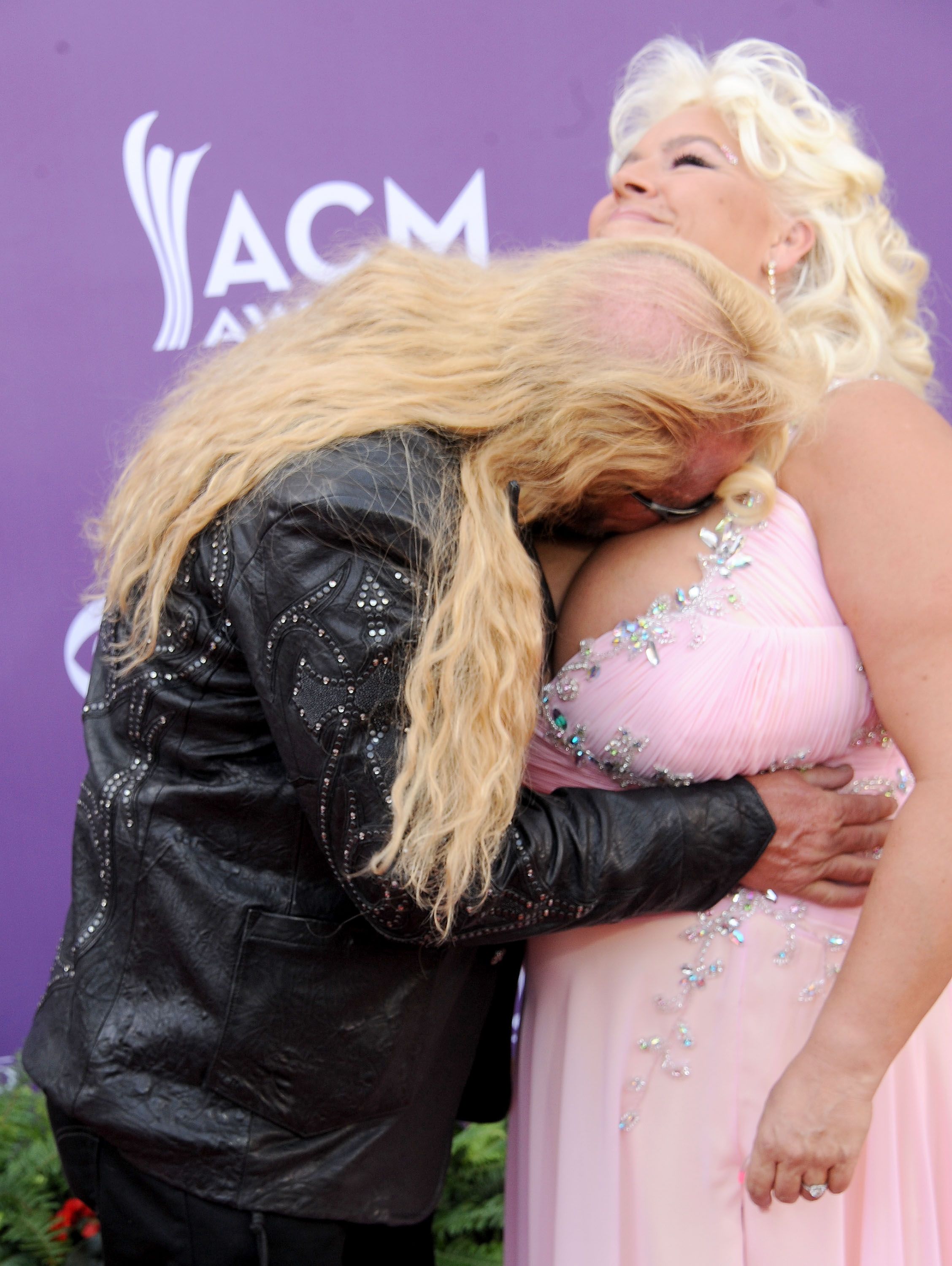Dog Bounty Hunter gets amorous with wife