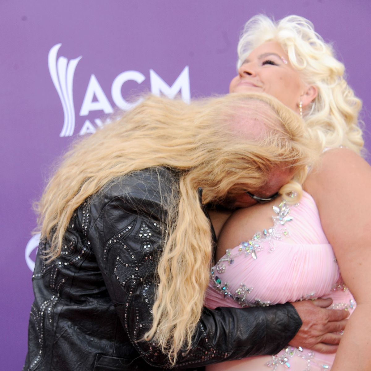 Dog Bounty Hunter gets amorous with wife