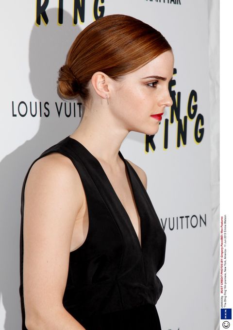 Emma Watson dons black dress to premiere