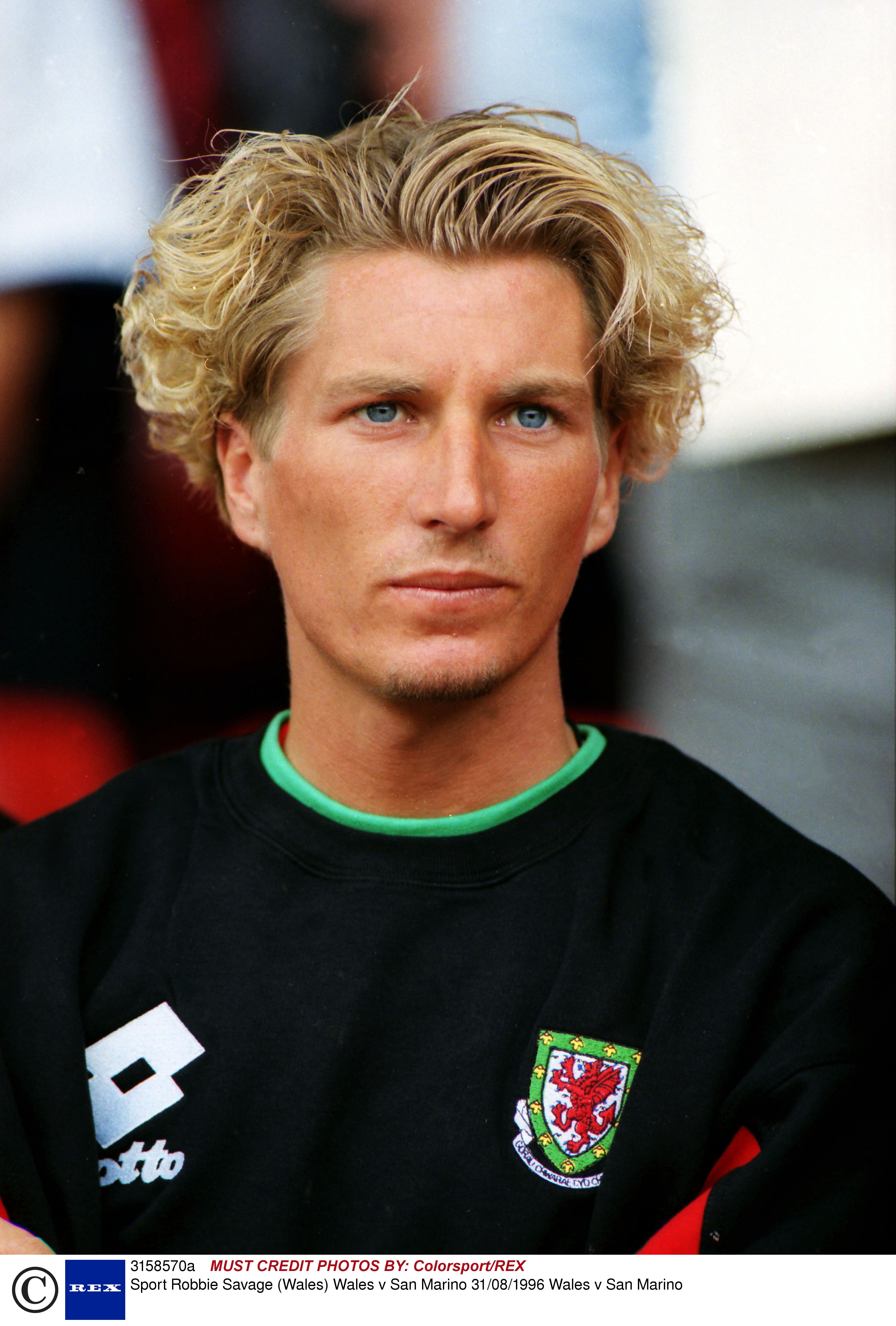 Robbie Savage chops off trademark locks