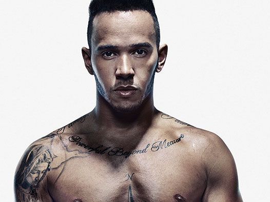 Lewis Hamilton bares his tattooed chest in a plunging printed shirt ahead  of the Miami Grand Prix