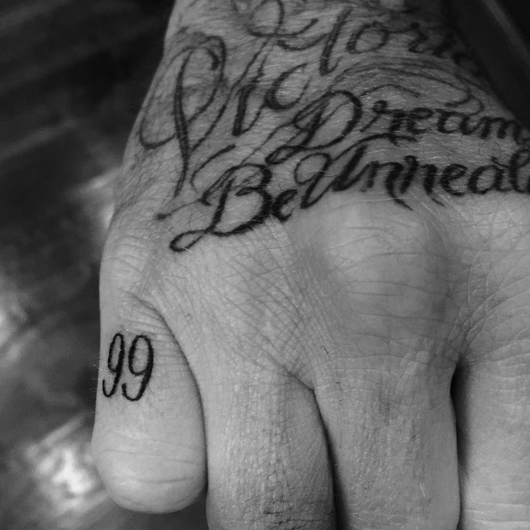 David Beckham debuts 99 tattoo on his pinky