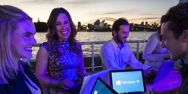 People gather for the launch of Microsoft's Windows 10