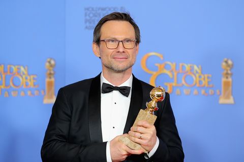 Christian Slater poses in the press room with his Golden Globe for Best Supporting Actor