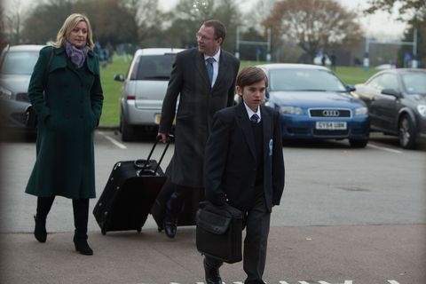 ​Bobby reluctantly heads into the school with Ian and Jane