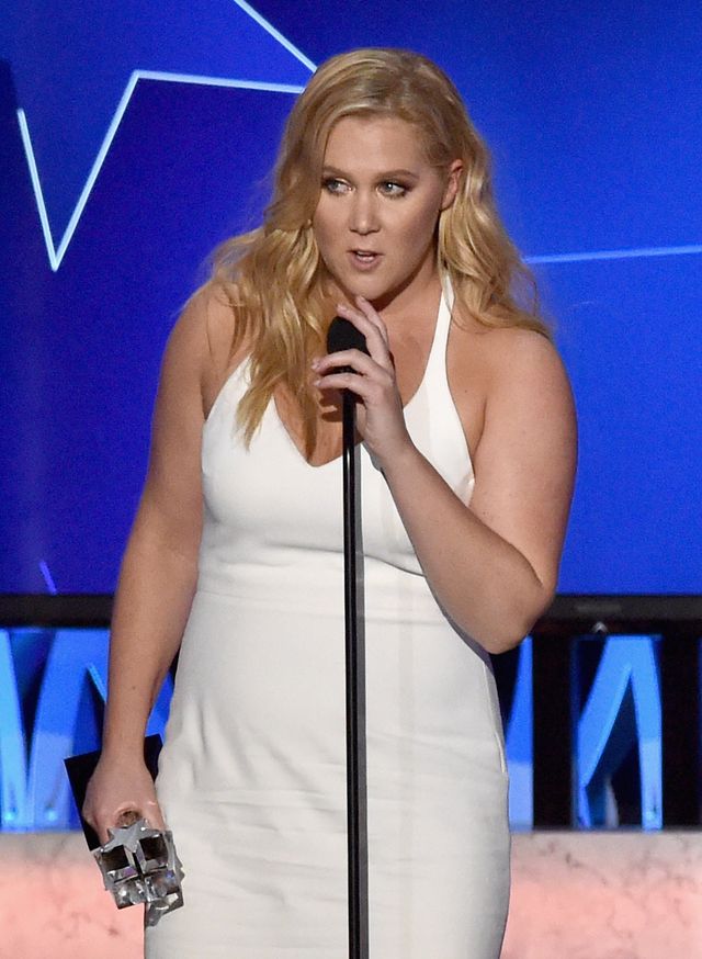 Amy Schumer hits back at critics with topless snap