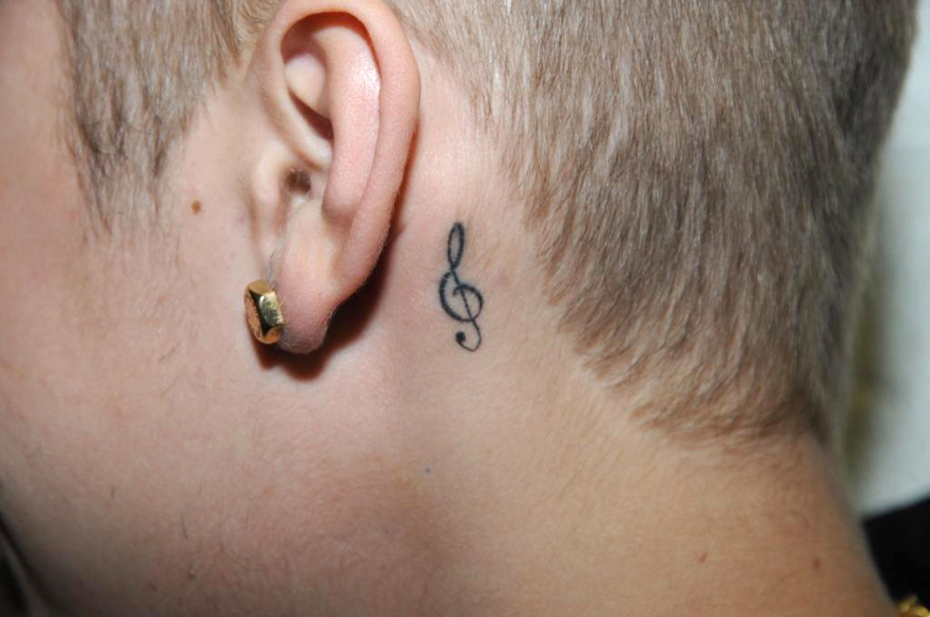 Tattoo uploaded by Kailey Reyes  Music Note And Wings Neck Tattoo   Tattoodo