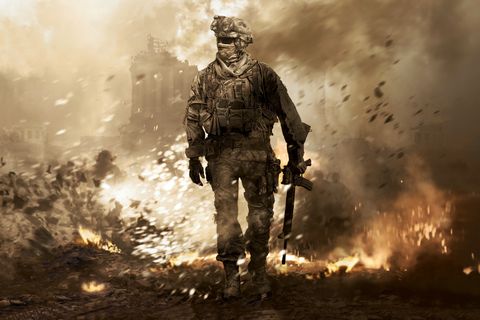 call of duty modern warfare 2 2009 original version cover poster, with a soldier in the desert