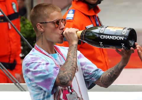 Justin Bieber sips Lewis Hamilton's victory champagne at the Monaco Grand Prix