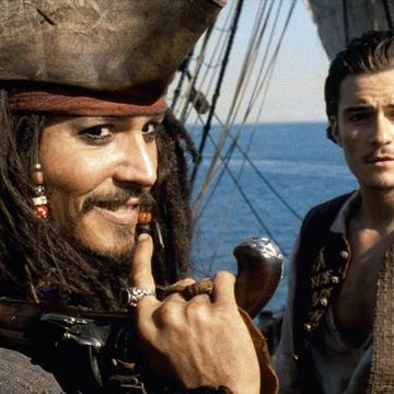 Johnny Depp as Jack Sparrow and Orlando Bloom as Will Turner in Pirates of the Caribbean