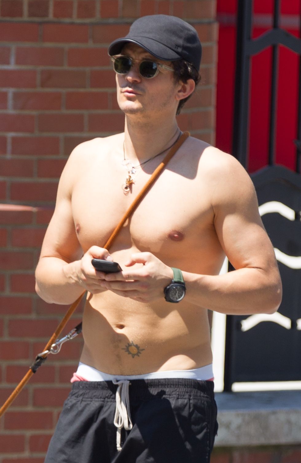 Orlando Bloom cannot stop getting naked on Katy Perry holiday