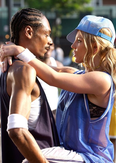 NEW YORK - JUNE 08: Rapper Snoop Dogg and Singer Britney Spears on the set of 'Outrageous' video shoot on June 8, 2004 in New York City.