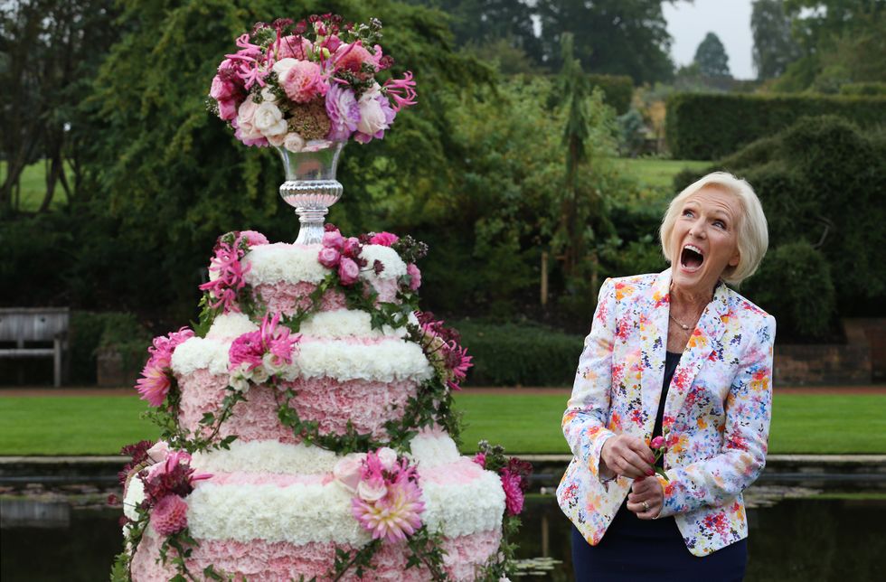Mary Berry laughs as she attends the opening of the RHS Flower Show at Wisley Gardens on September 2, 2014