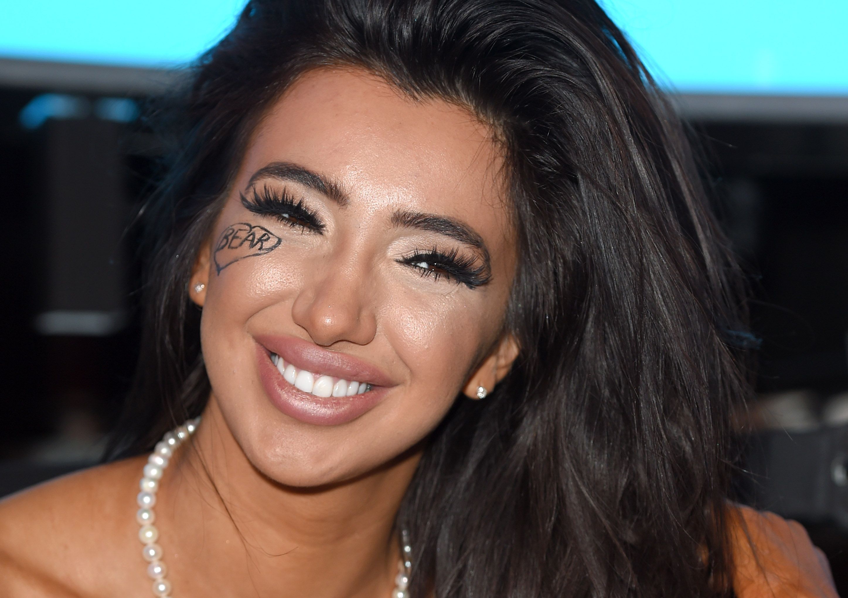 Oo-er. Celebrity Big Brother's Chloe Khan accidentally exposes her nipple…  hanging out with Stephen Bear's dad