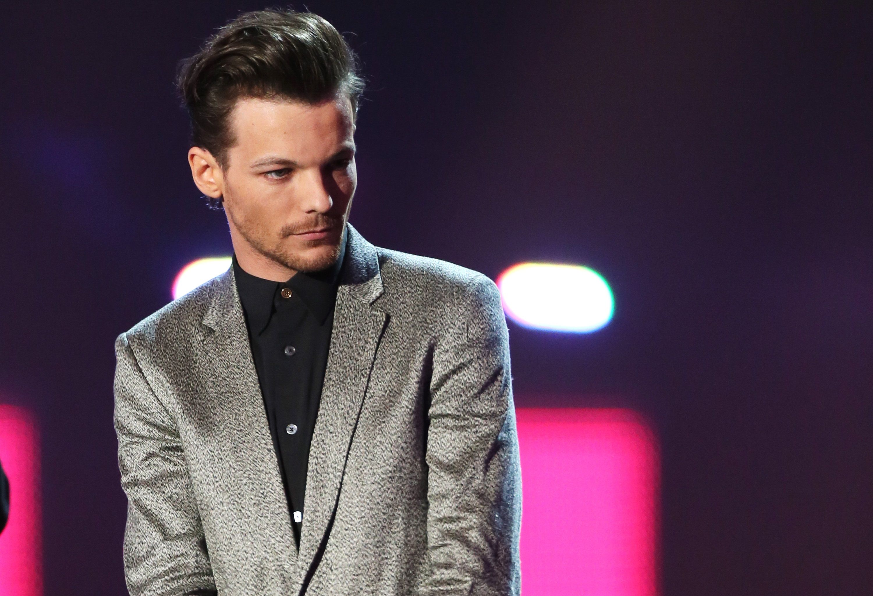 One Direction's Louis Tomlinson Signs Record Deal With BMG for His Second  Solo Album