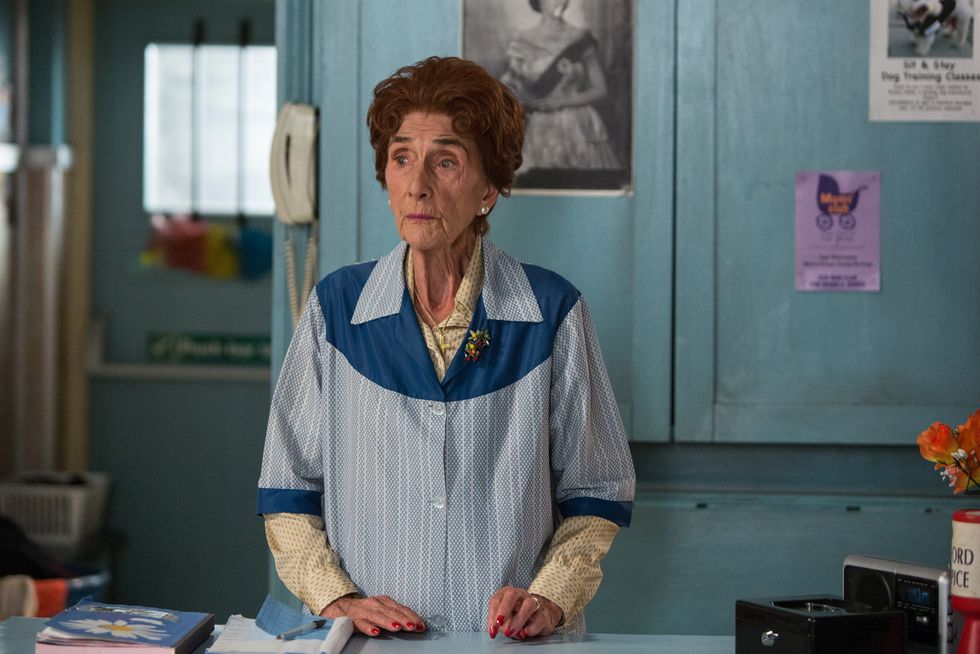 dot branning is upset after a phone call in eastenders