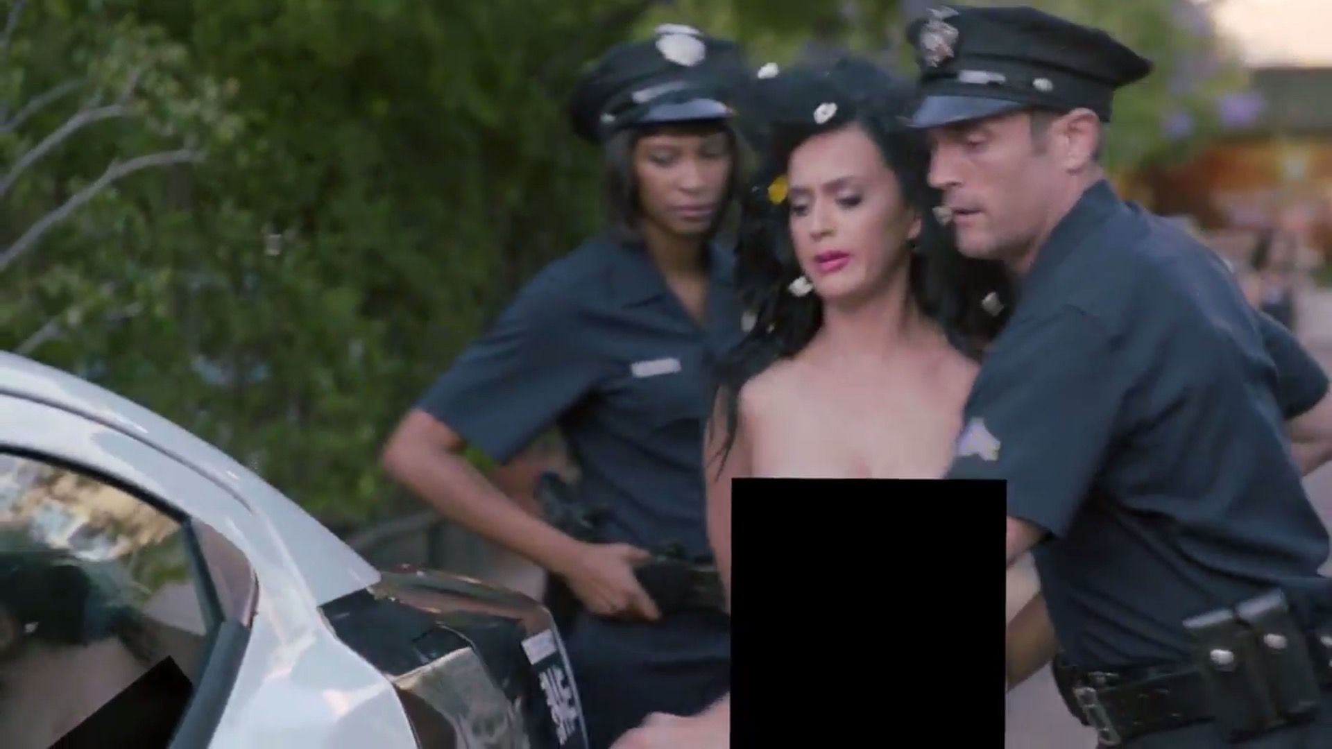 Katy Perry gets arrested while fully naked in new Twitter election video