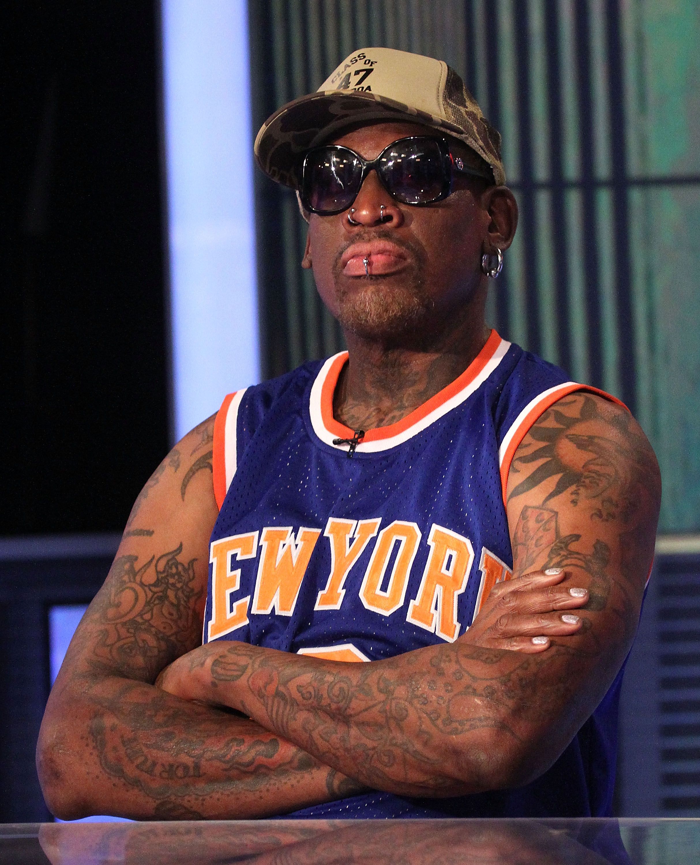 Forward Dennis Rodman of the Los Angeles Lakers looks on during the News  Photo - Getty Images