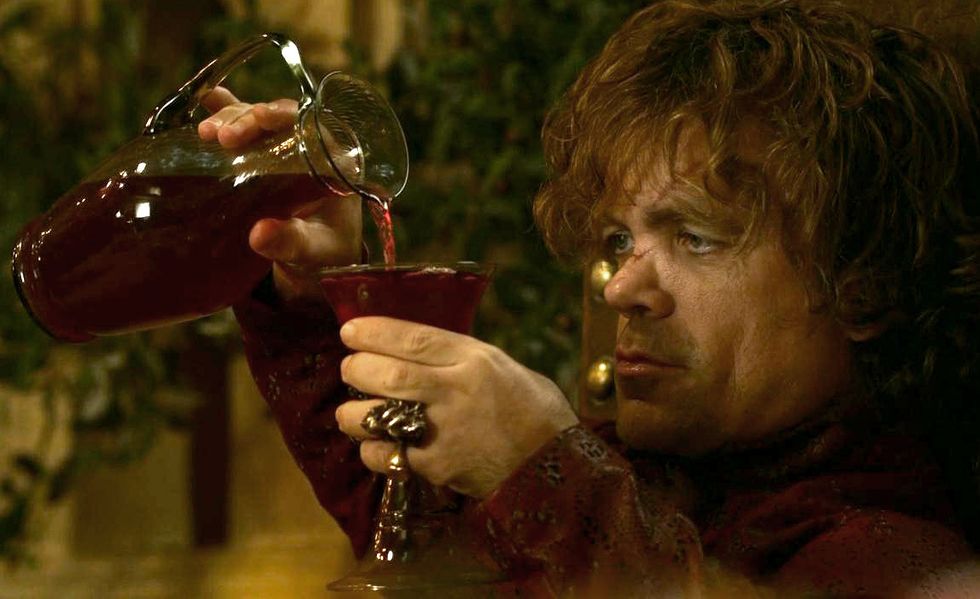 game of thrones   tyrion pours wine
