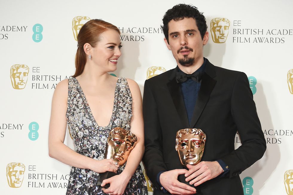 Emma Stone and Damien Chazelle with their BAFTAs for La La Land