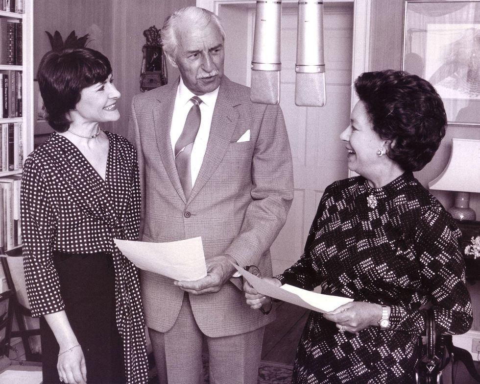 Sara Coward and Arnold Peters - who play Caroline Sterling and Jack Woolley in The Archers with the late Princess Margaret during the recording of an episode of the Archers. The Duchess of Cornwall is the latest royal to feature in The Archers, June 1984