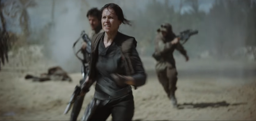 Jyn running on beach still Rogue One: A Star Wars Story