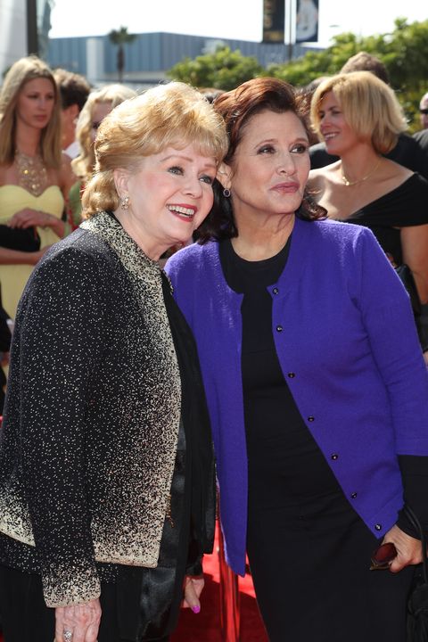 Debbie Reynolds (L) and Carrie Fisher attend the 2011 Primetime Creative Arts Emmy Awards at Nokia Theatre on September 10, 2011 in Los Angeles, California. (Photo by Noel Vasquez/Getty Images)
