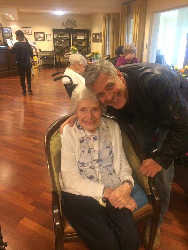 George Clooney visiting elderly fan at care home