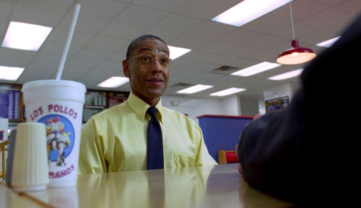 Gus Fring from Braking Bad pretending he is simply a humble fast food franchise owner