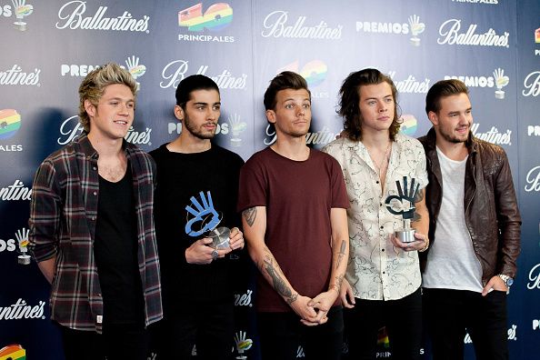 Louis Tomlinson says Harry Styles is holding up 1D reunion